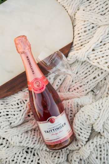 Fall entertaining tip: Enjoy Taittinger Prestige Rose on cozy white blanket (1)