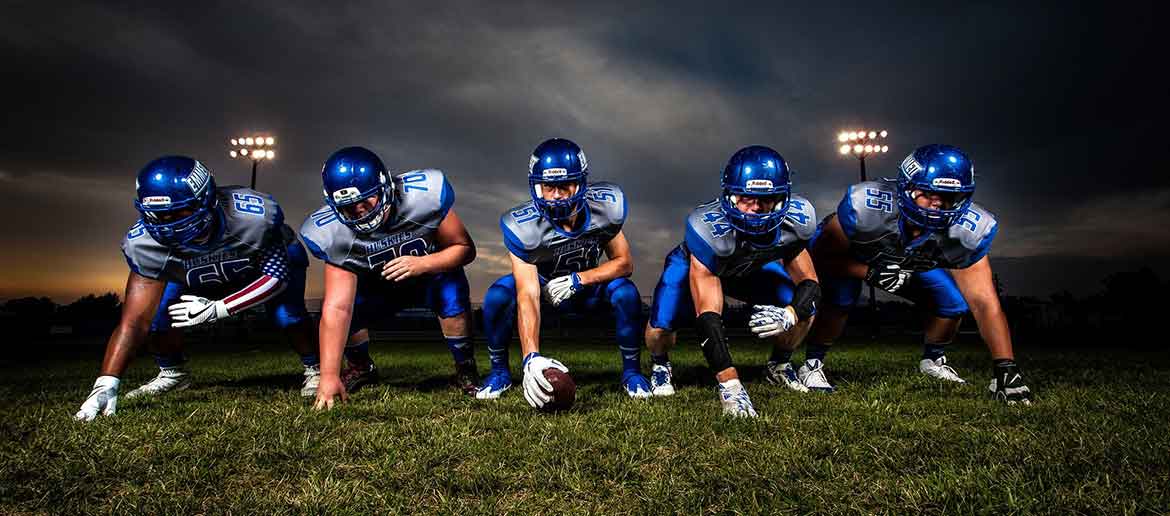 Football players lined up on a field