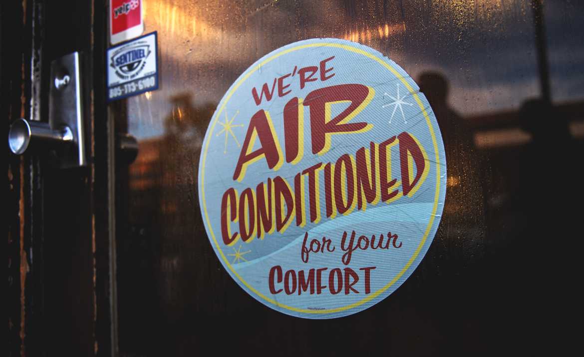 Sign describing air conditioned for your comfort