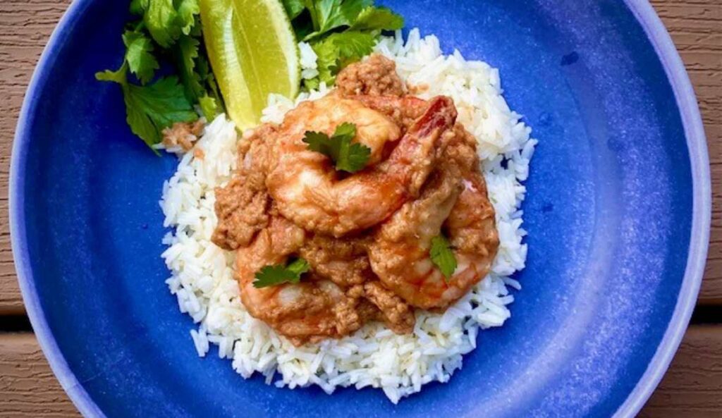 Thai Peanut Coconut Shrimp on blue dish