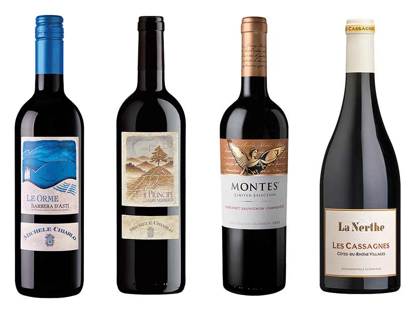 Four red wine bottles from Michele Chiarlo, Montes, and Chateau La Nerthe